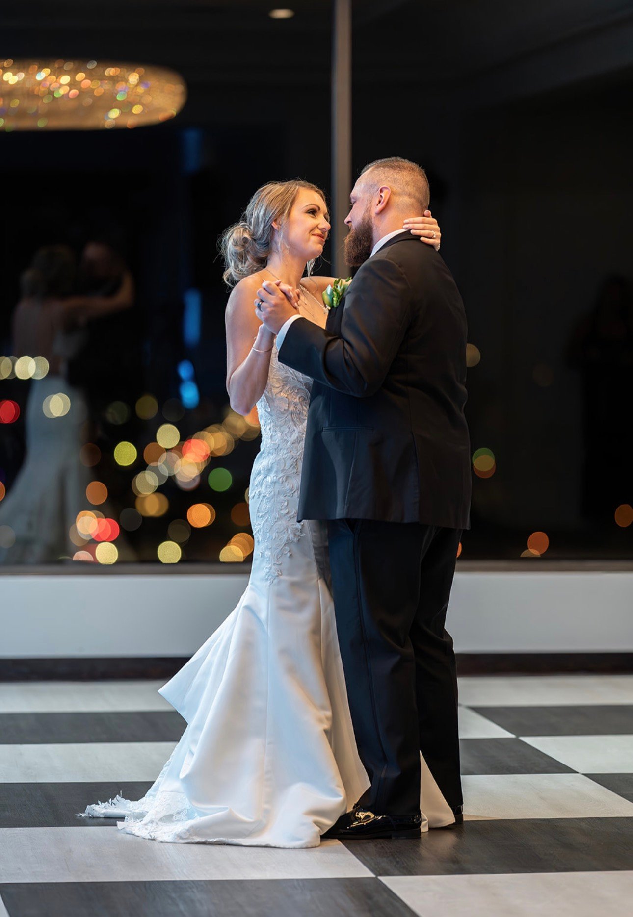 Newlyweds sharing a dance at their reception